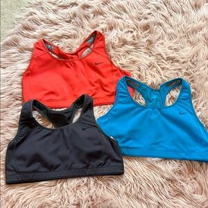 Nike Women's Sports Bras Top Set - Red/orange, Blue, and Dark Grey.  All 3!